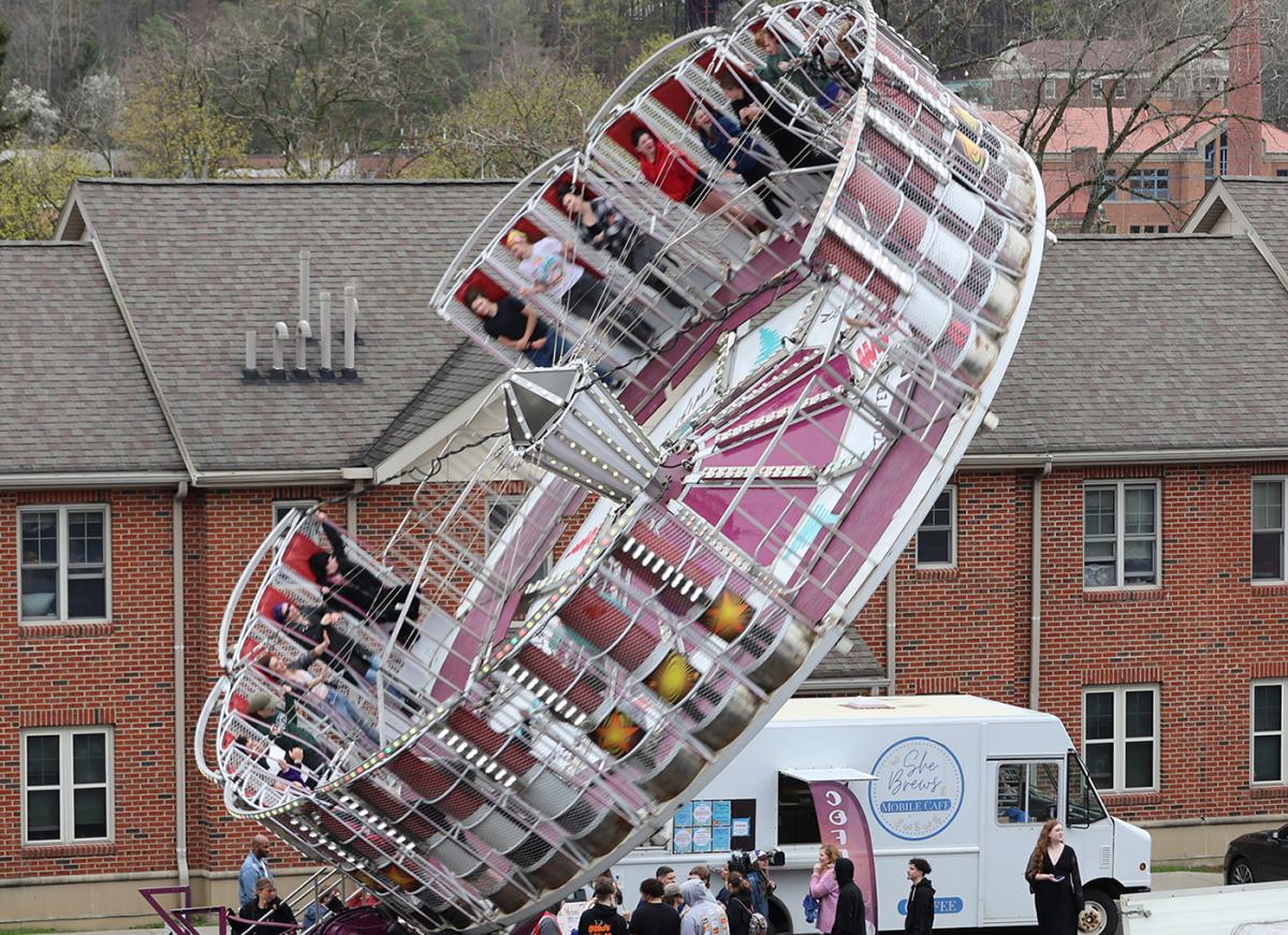 students enjoy a ride at Hot Dog Day