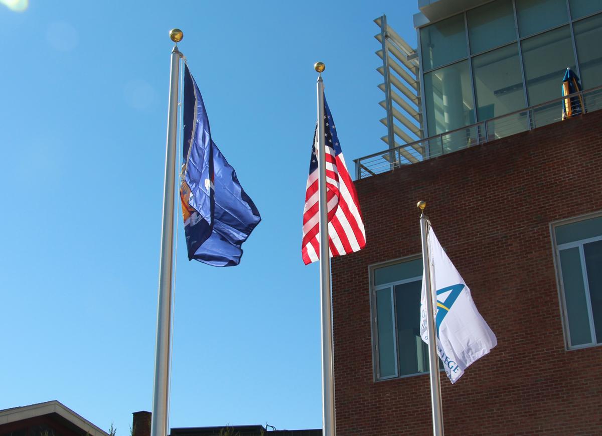 Flag poles outside of the Student Leadership Center