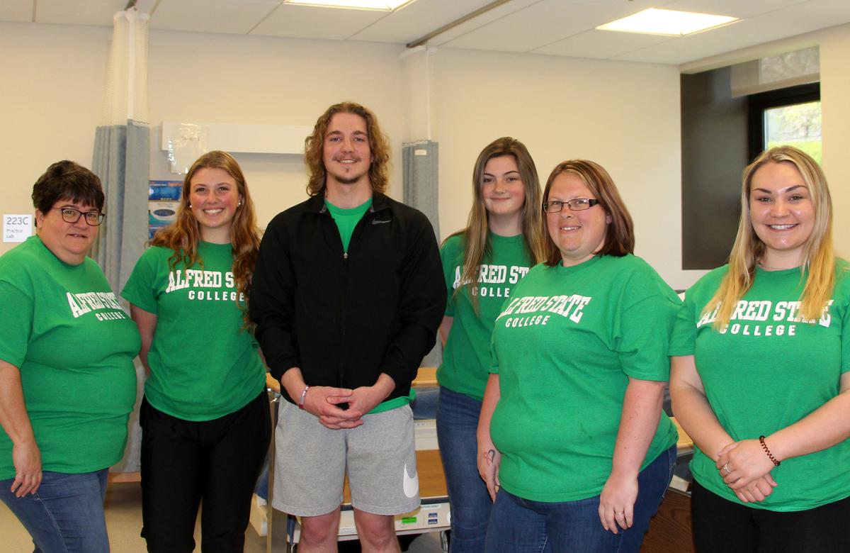 A group of Alfred State nursing students will travel to Ireland to learn more about the healthcare system in that country. (From L to R): Associate Professor KathyAnn Sager, Avery Grusendorf, Maxwell McCumiskey, Leah McCormick, Bethany Gayhart, and Molly 