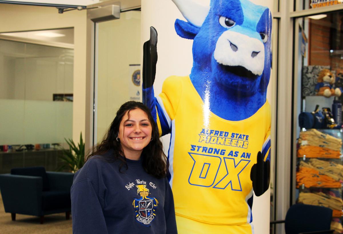 Katelyn James stands outside the admissions office