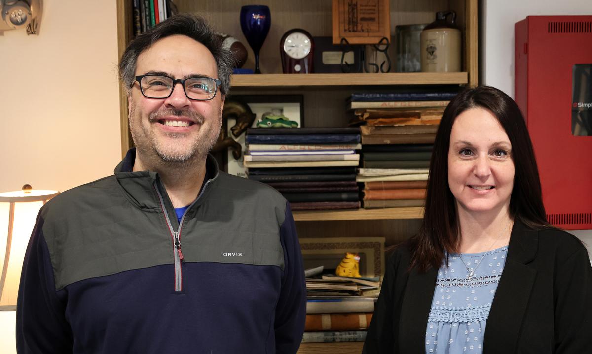 John Lewis and Sandy Burdick in the alumni house