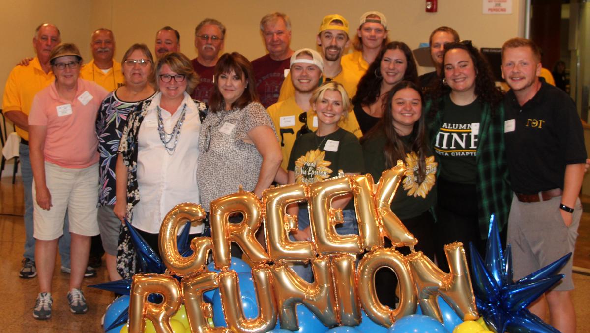 Little brothers and little sisters gathered for a photo during the Alfred State All Greek Reunion.