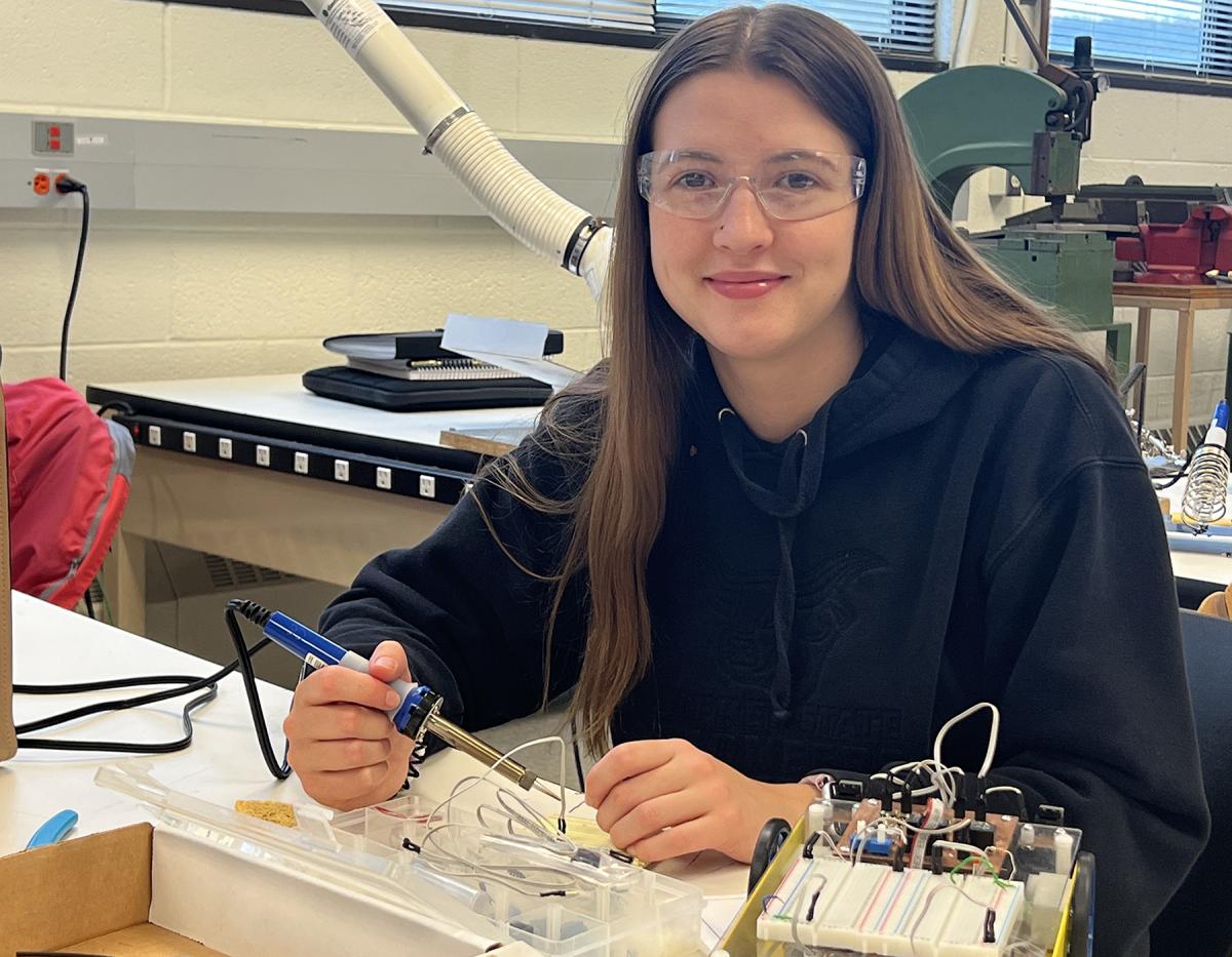 student working in a mechatronic lab