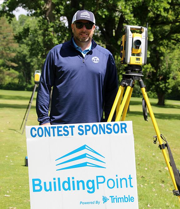 Steven Montgomery with the Trimble Robotic Total Station at the Drive for Development Fund Golf Tournament
