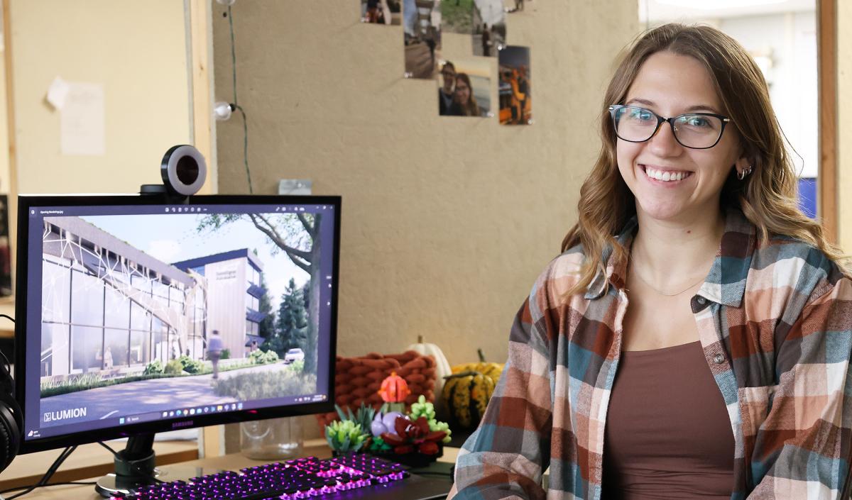 Student sits in front of her computer