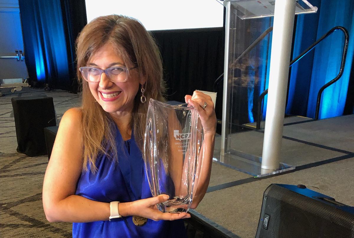 Patricia Orsini Nilsen with her trophy after winning the NCRA speed contest.
