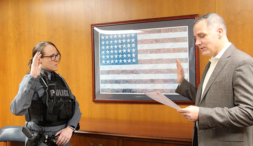 Officer Jessica Middaugh is sworn in by Alfred State President Dr. Steven Mauro.