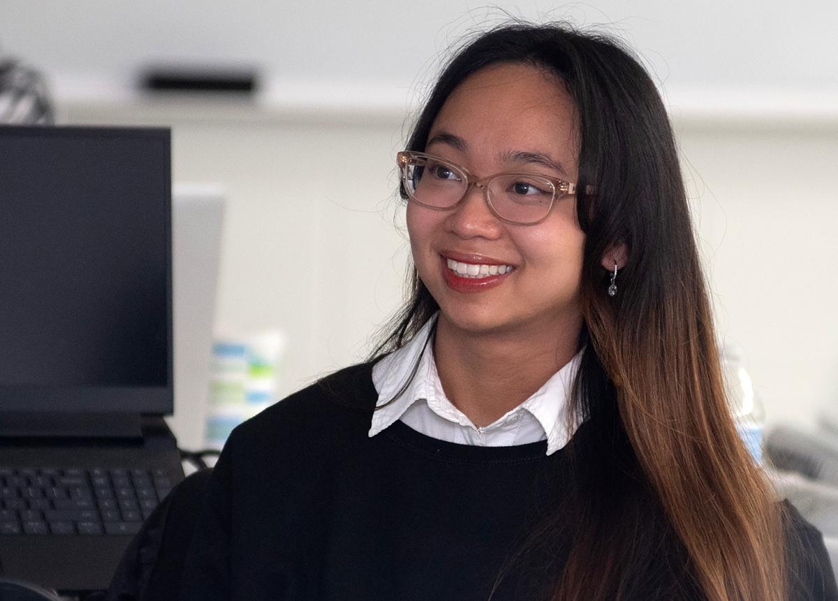 Vina Pham sits in a class