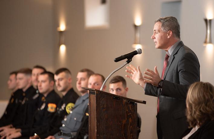 Dr. Mauro congratulates the 2023 graduates of the Police Academy
