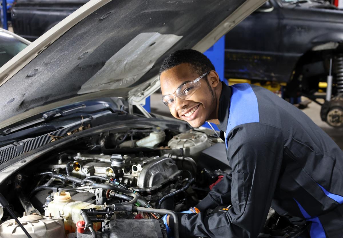 Student works on a car