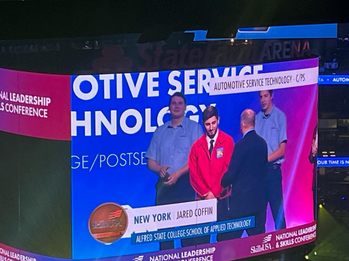 Jared Coffin receives his award for placing 3rd in the Automotive Service Technology competition at the SkillsUSA National Championships.
