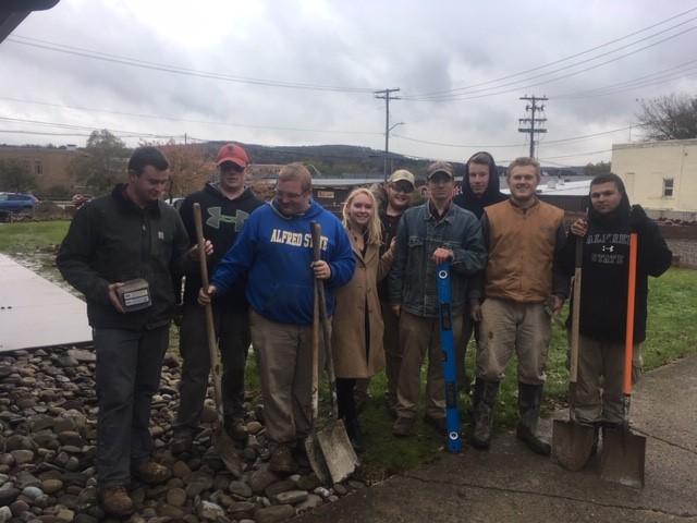 SkillsUSA Club group installing footers for music notes
