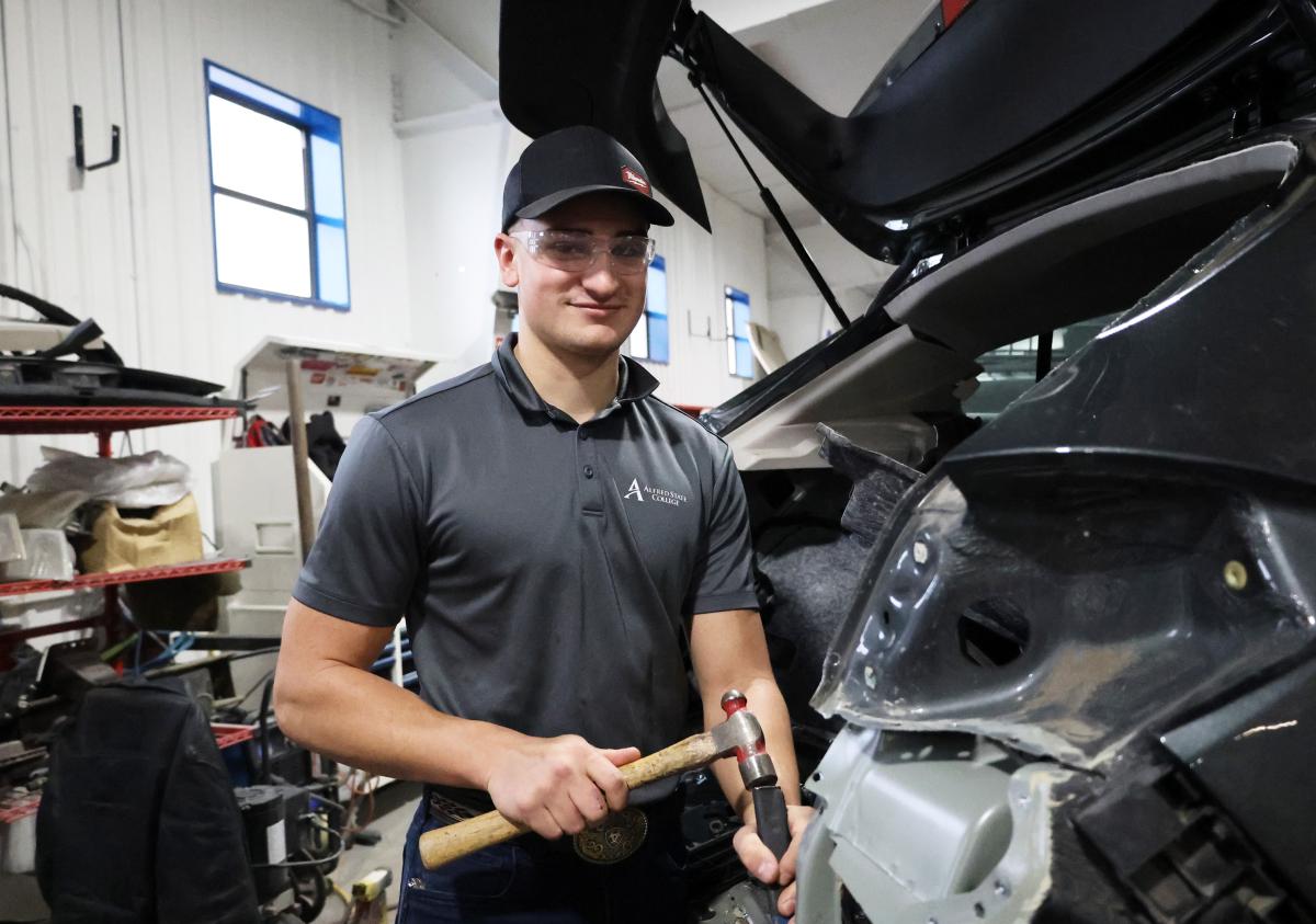 student works in autobody shop