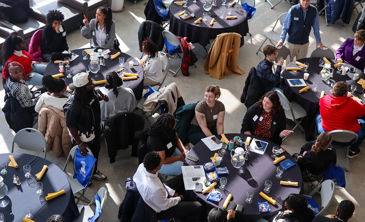 students eating lunch at a conference