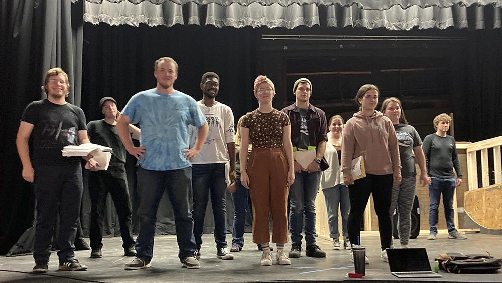 Members of the cast of “Sweeney Todd” take a break from a recent rehearsal.