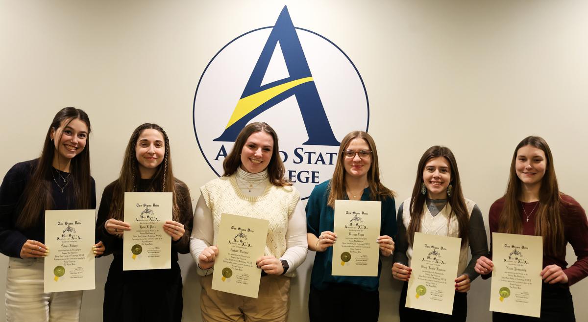 students inducted into Tau Sigma Delta 