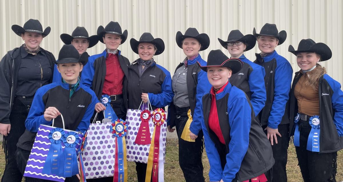The western equestrian team poses for a team picture following a show