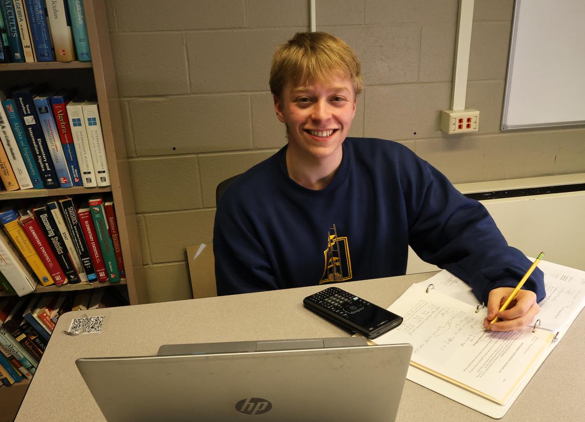 student working on math homework