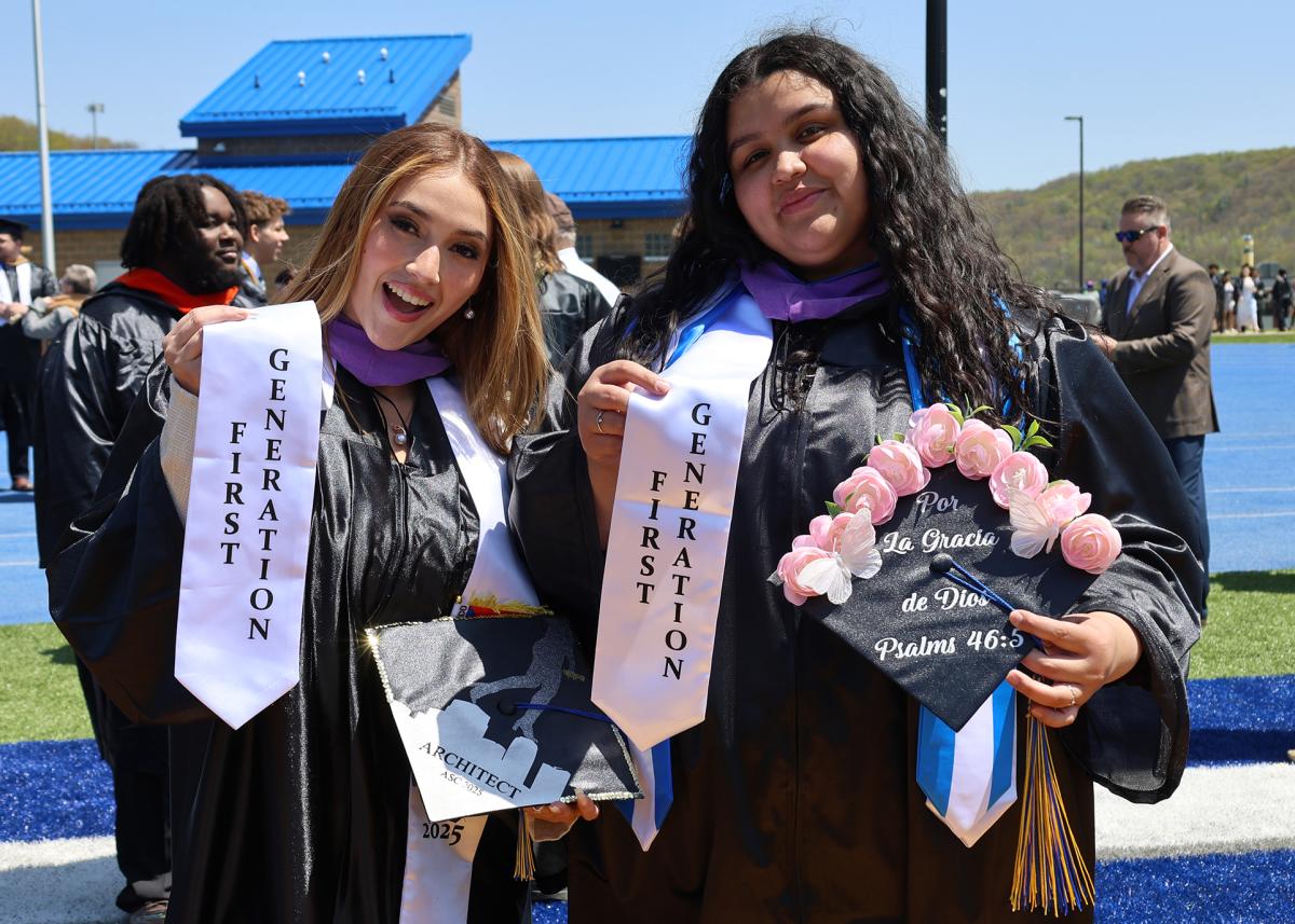 pair of first generation students at commencement