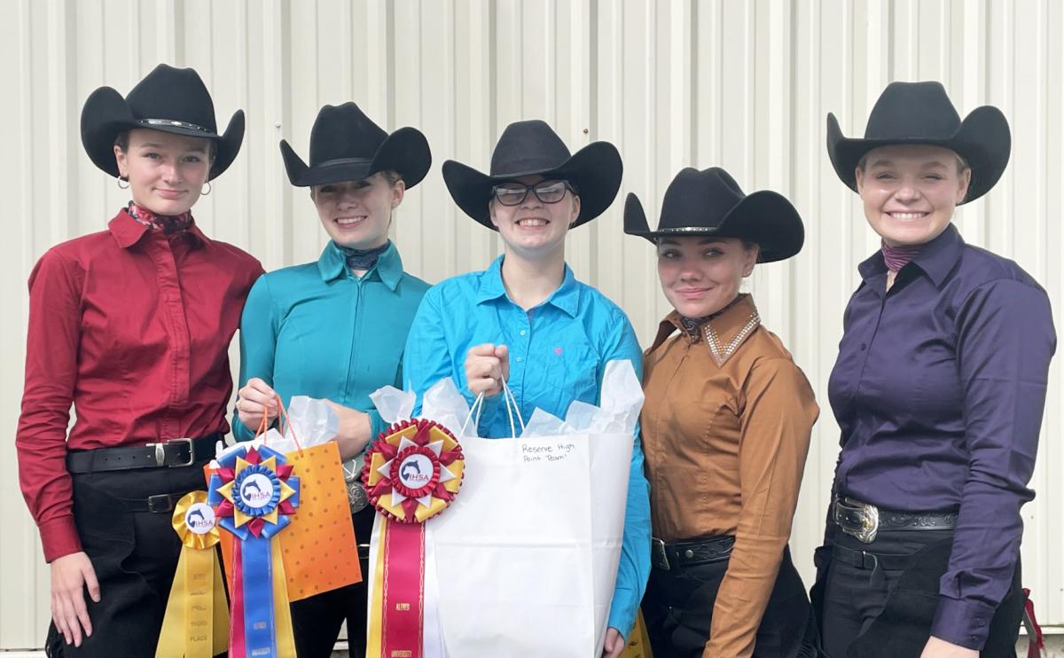 Members of the Alfred State western equestrian team display their awards from their season opening competition.