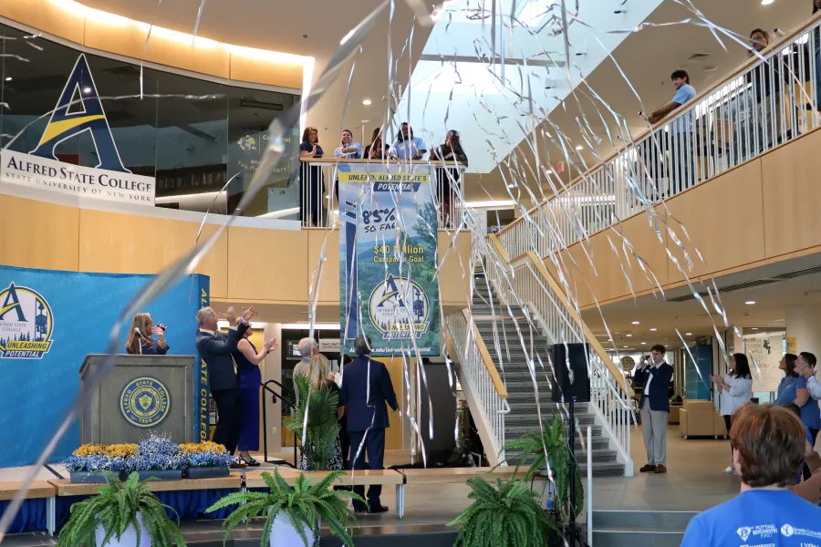 streamers blanket the crowd at a campaign kickoff