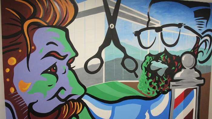 ART at ASC includes a new mural in the barber shop and styling space at Pioneer Center.
