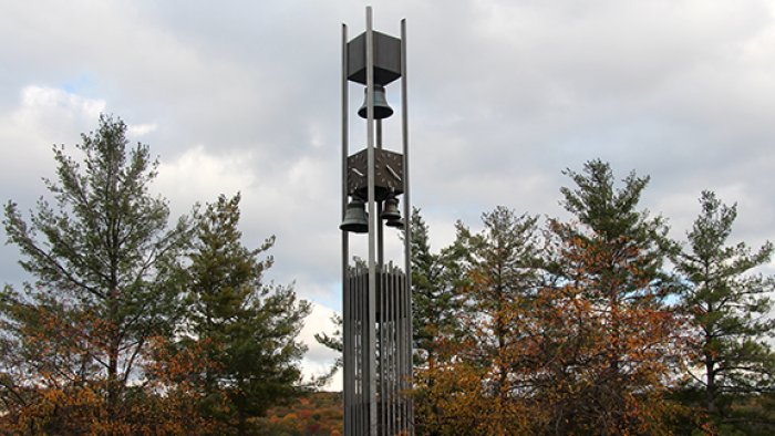 Approximately 6,500 pounds of newly restored bells are hung prior to the 50th anniversary of Hinkle Bell Tower.