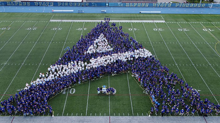 Alfred State first-year students make their first “A” at Pioneer Stadium prior to the start of the Fall 2022 semester. This picture was the most shared picture of 2022.