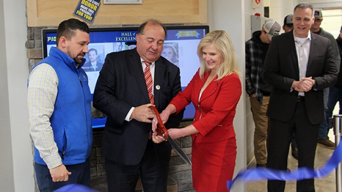 J. Joseph Wilder and his wife Laura Linneball cut the ribbon at the Hall of Excellence located in the Workforce Development Center on the Wellsville campus. Joining them are Director of Development Jason Sciotti (far left) and ASC President Dr. Steven Mauro (far right).