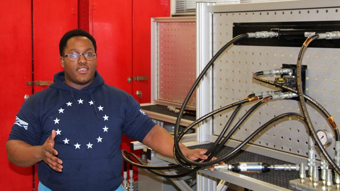 Gabriel Cooks works on a project in one of the mechanical engineering technology labs.