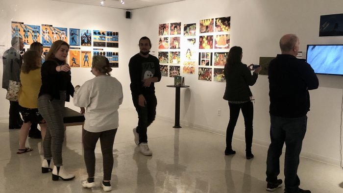 Visitors of the Bret Llewellyn Gallery enjoy projects by Alfred State Digital Media and Animation students.