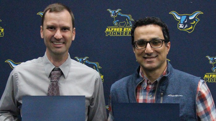 Peter McClain and Dr. Reza Yadollahi were honored with the Leadership through Civic Engagement award.