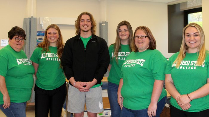 A group of Alfred State nursing students will travel to Ireland to learn more about the healthcare system in that country. (From L to R): Associate Professor KathyAnn Sager, Avery Grusendorf, Maxwell McCumiskey, Leah McCormick, Bethany Gayhart, and Molly Arnold. Missing Samantha Price.