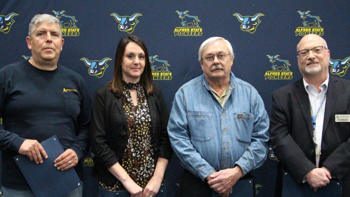 Alfred State awarded the Pioneer Award to Daniel Foster,  Sandy Burdick, Timothy Dickerson, and Dan Jardine.