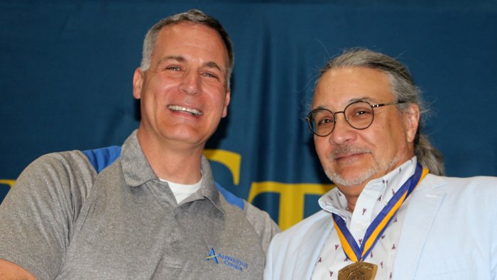 Alfred State President Dr. Steven Mauro with Chancellor’s Award winner David Carli.