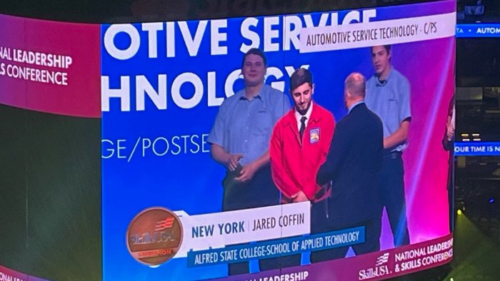Jared Coffin receives his award for placing 3rd in the Automotive Service Technology competition at the SkillsUSA National Championships.