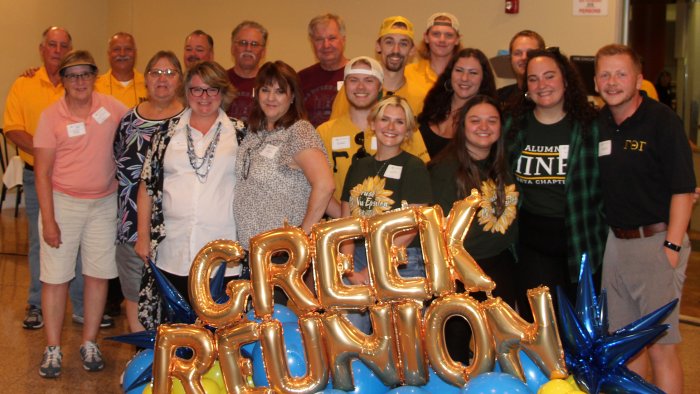 Little brothers and little sisters gathered for a photo during the Alfred State All Greek Reunion.