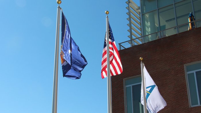 Flag poles outside of the Student Leadership Center