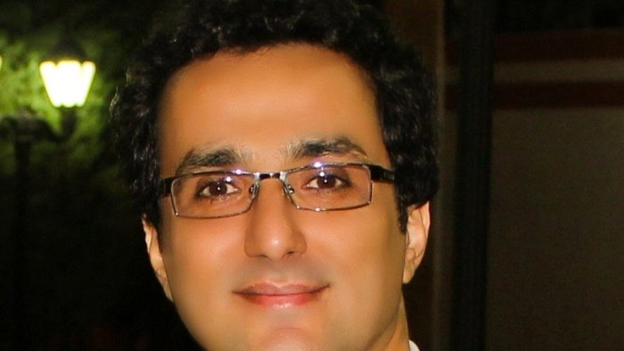 headshot of Dr. Reza Yadollahi