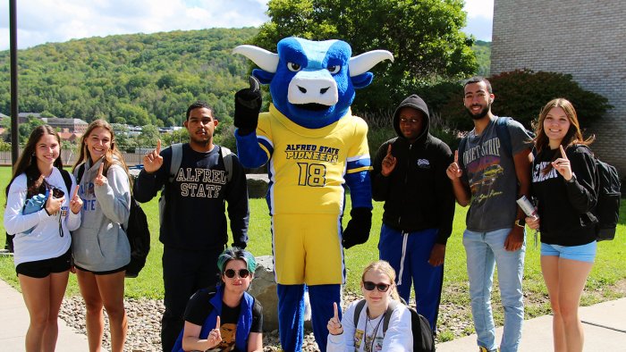 Photo of Big Blue and Alfred State students celebrate the recent news that Alfred State is once again ranked the No. 1 SUNY and continues to climb in the US News & World Report rankings of Northern Regional Colleges.