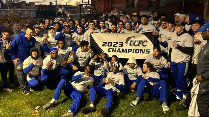 The football team celebrates the ECFC Championship