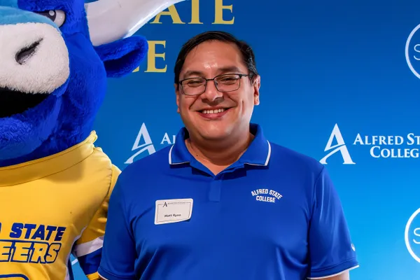 A photo of Matt Ryan wearing glasses.