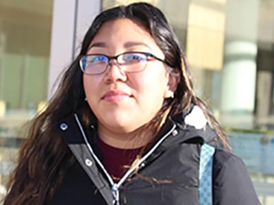 Carolina Monterrosas outside wearing a coat