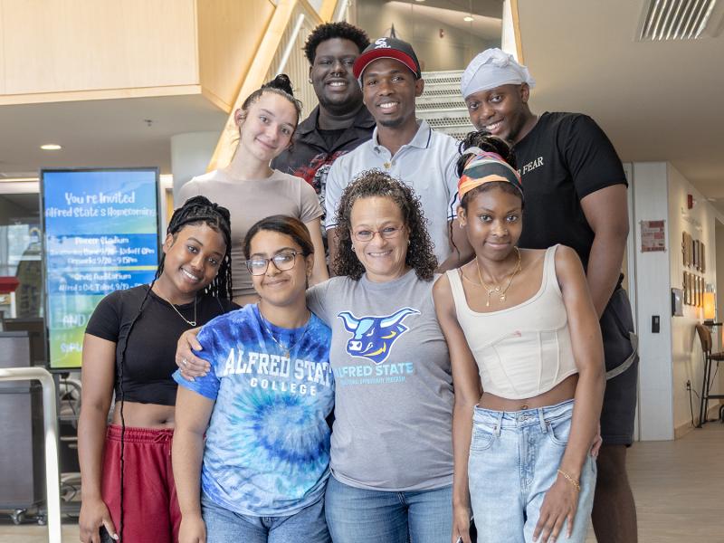 Students pose with EOP Director Nadine Shardlow