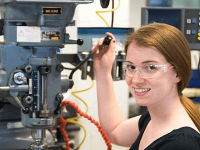 Elizabeth Glick at a machine