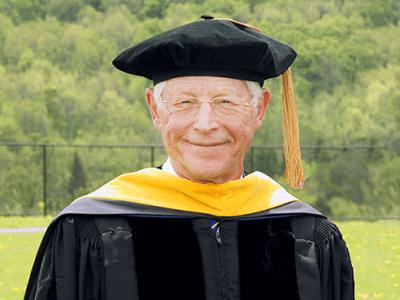 Dr. James Ferry with cap and gown on