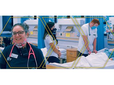 Jess Lippa in a nursing lab, students in background
