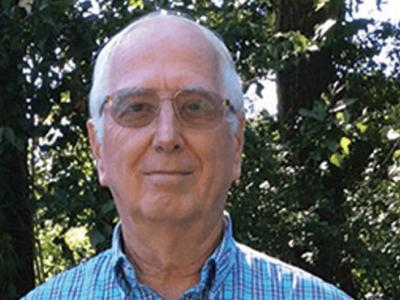 Lee Brasted, trees behind him