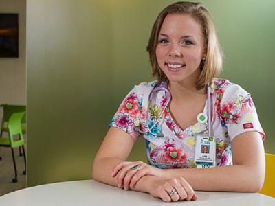 Lisa Reynolds sitting at a table
