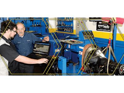 Mike Ronan with a student in the lab